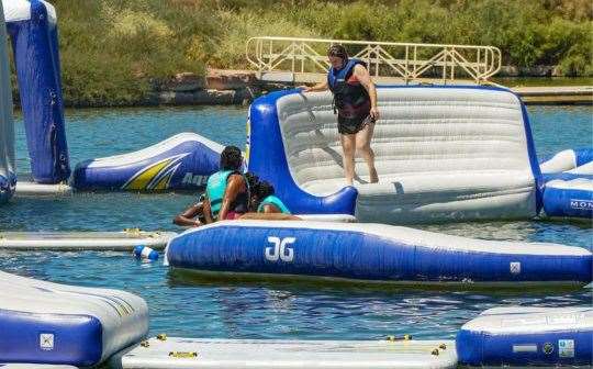 The aqua park is just one of many outdoor activities at St Andrews Lakes. Picture: Aquaglide Aquaparks