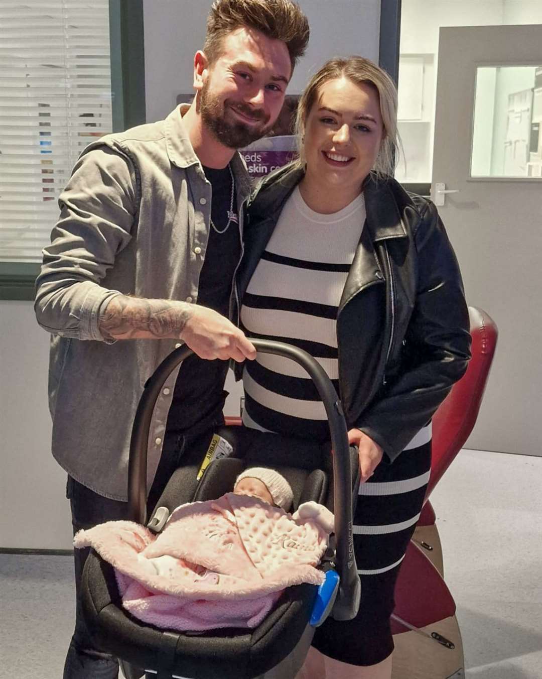 Marcus and Rachel Gilmore with their daughter Raina leaving Antrim Area Hospital (Gilmore Family/PA)