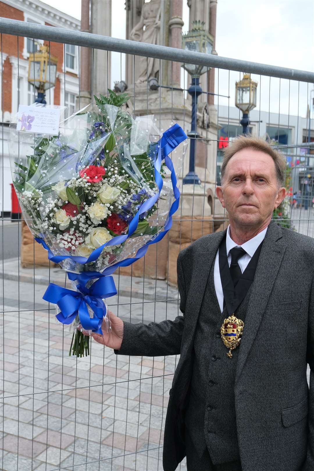 Cllr Derek Mortimer, Mayor of Maidstone, laying flowers for the Queen