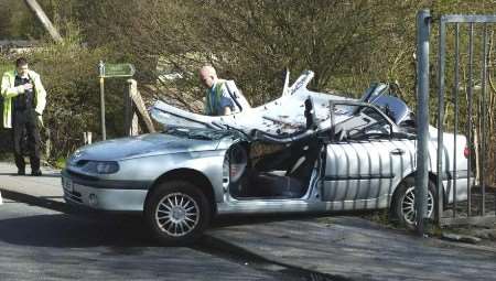 Police officers at the scene of the crash. Picture: PHIL HOUGHTON