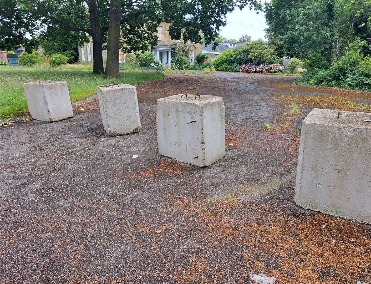 Concrete blocks prevent entry to the former Hadlow Manor Hotel