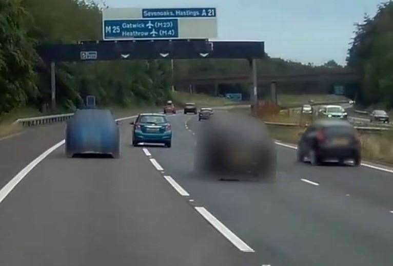 The car is seen swerving across the lanes on the M25. Picture: CPS South East