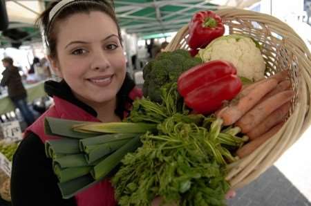 Nicole Hassan with some of her vegetables on sale at the West Malling farmers' market. Picture: David Antony Hunt