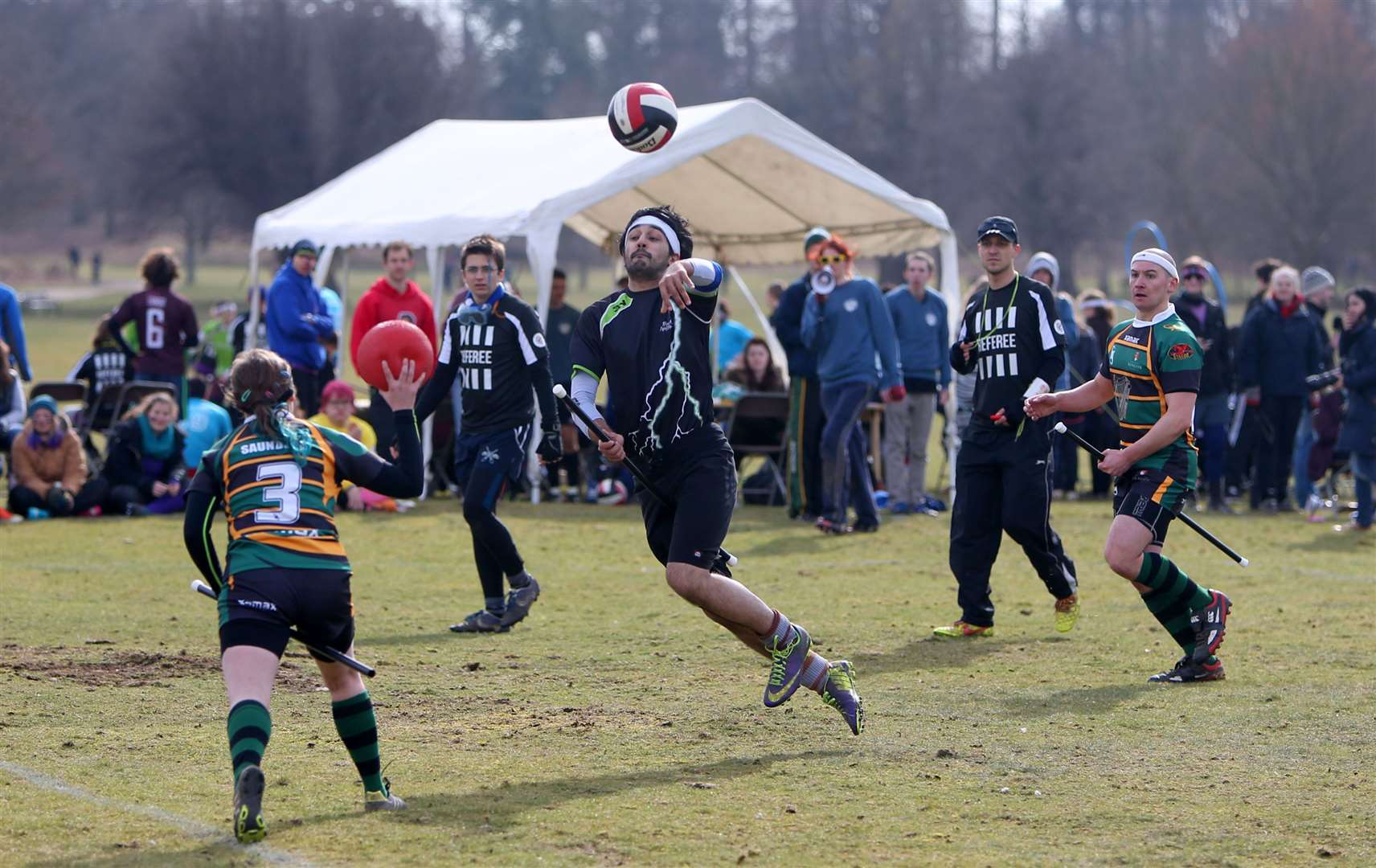 People playing quidditch, inspired by a game in the Harry Potter books (Simon Cooper/PA)