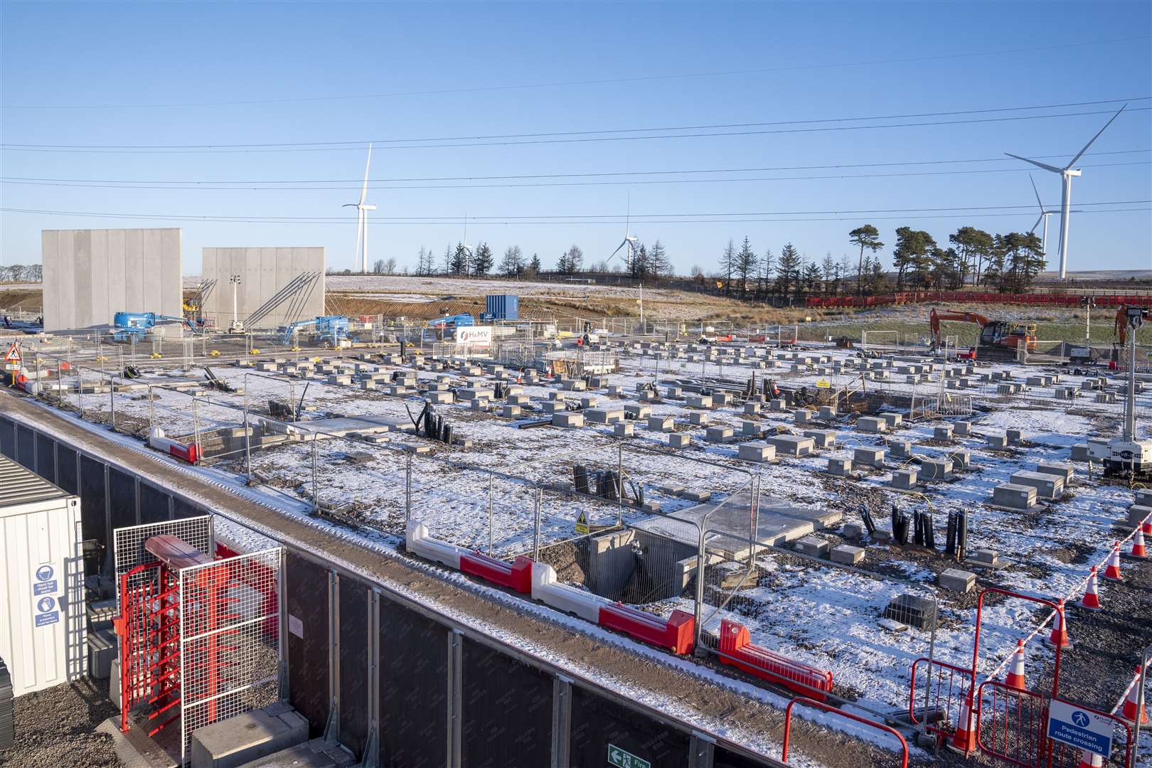 Each site will have a number of enclosures housing battery packs (Jane Barlow/PA)