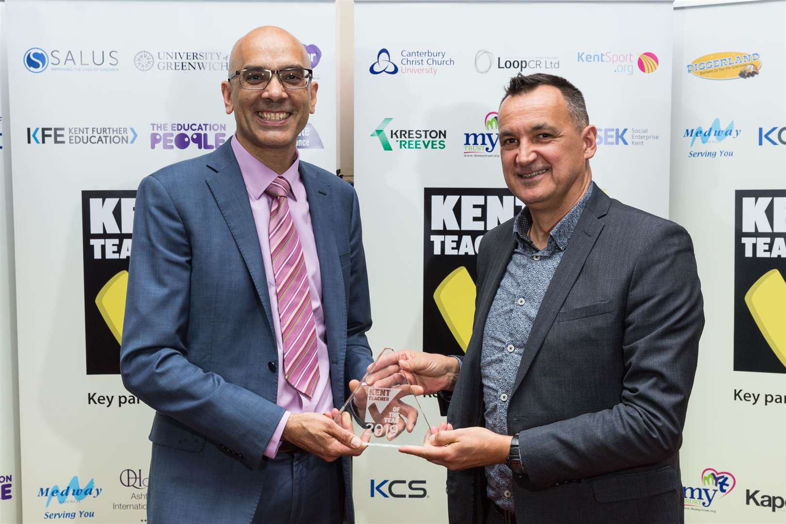 from left, Garry Simmons Overall Kent Secondary School Teacher of the Year of Wilmington Grammar School For Girls, University of Kent âSteven Holdcroft. Kent Teacher of the Year 2019 awards. Ashford International Hotel, SimonÃ© Weil Avenue, Ashford. .Picture Submitted by: Martin Apps.KM Group has permission to sell this image via photo sales and to re-sell the image to other media for single-use publication.. (10146220)