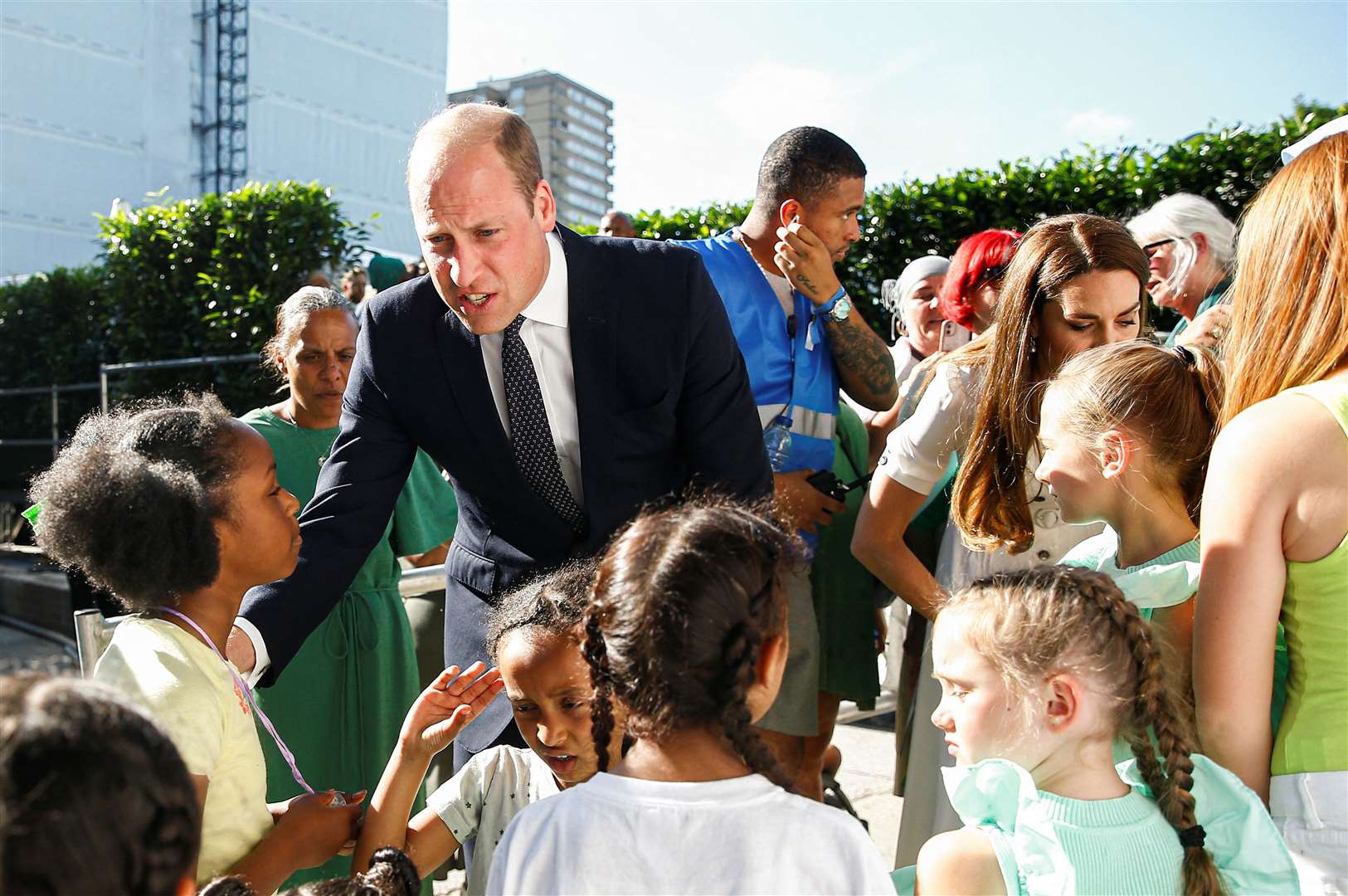 William and Kate speak to children during the service (Peter Nicholls/PA)