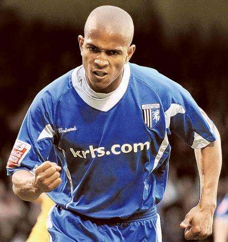 Simeon Jackson celebrates scoring from the penalty spot against Rochdale