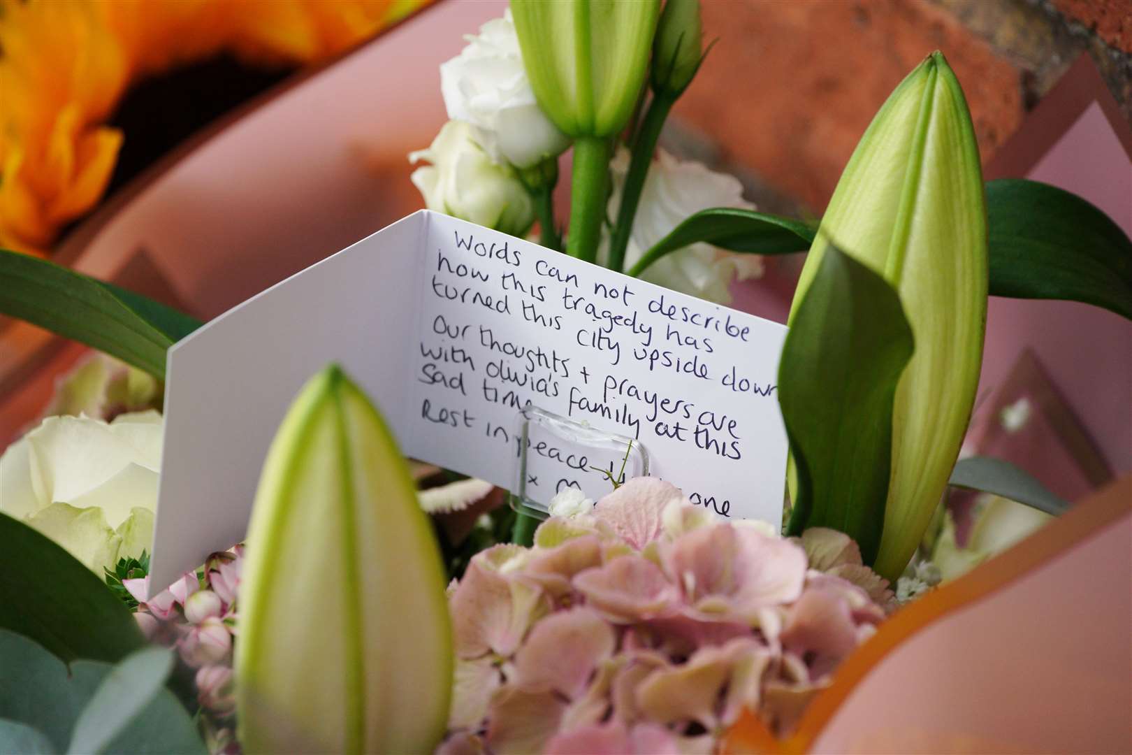 Flowers left near the scene in Kingsheath Avenue, Knotty Ash (Peter Byrne/PA)