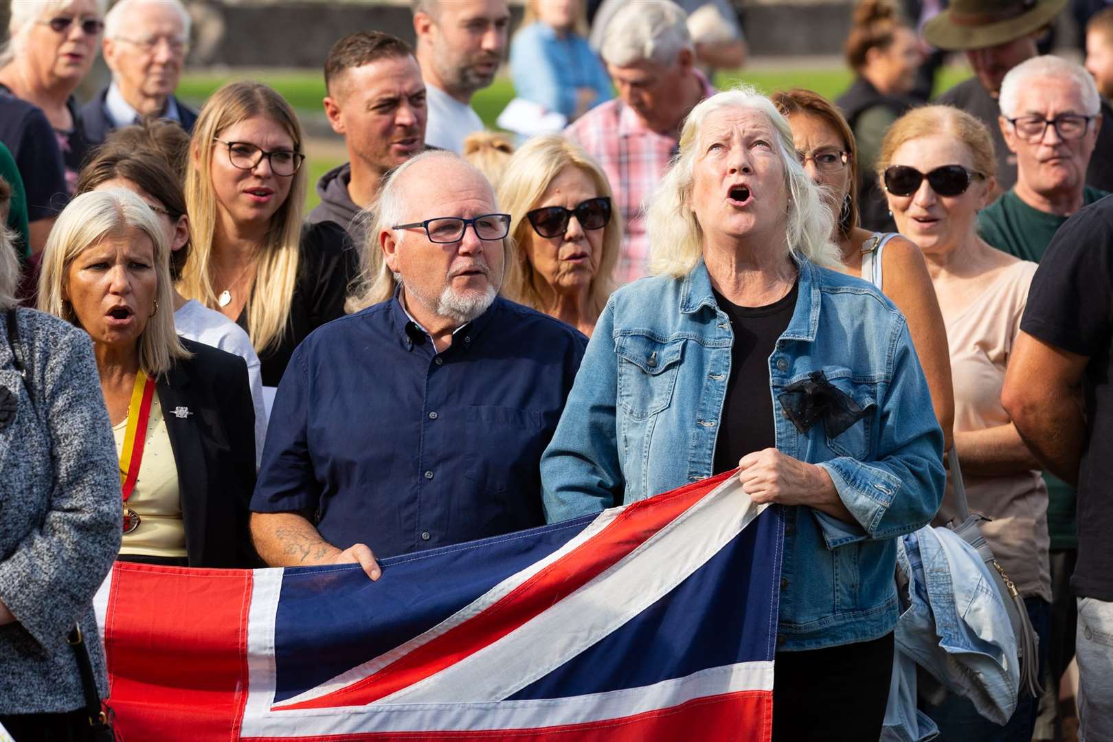 People watch and lay flowers at Rochester Castle for the proclamation of the new King. Picture: Medway Council (59241413)