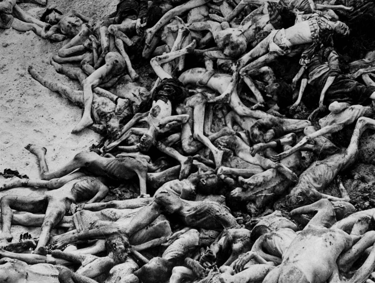 A mass grave within the camp – broadcaster Richard Dimbleby described Belsen as ‘the world of nightmare’ (PA)