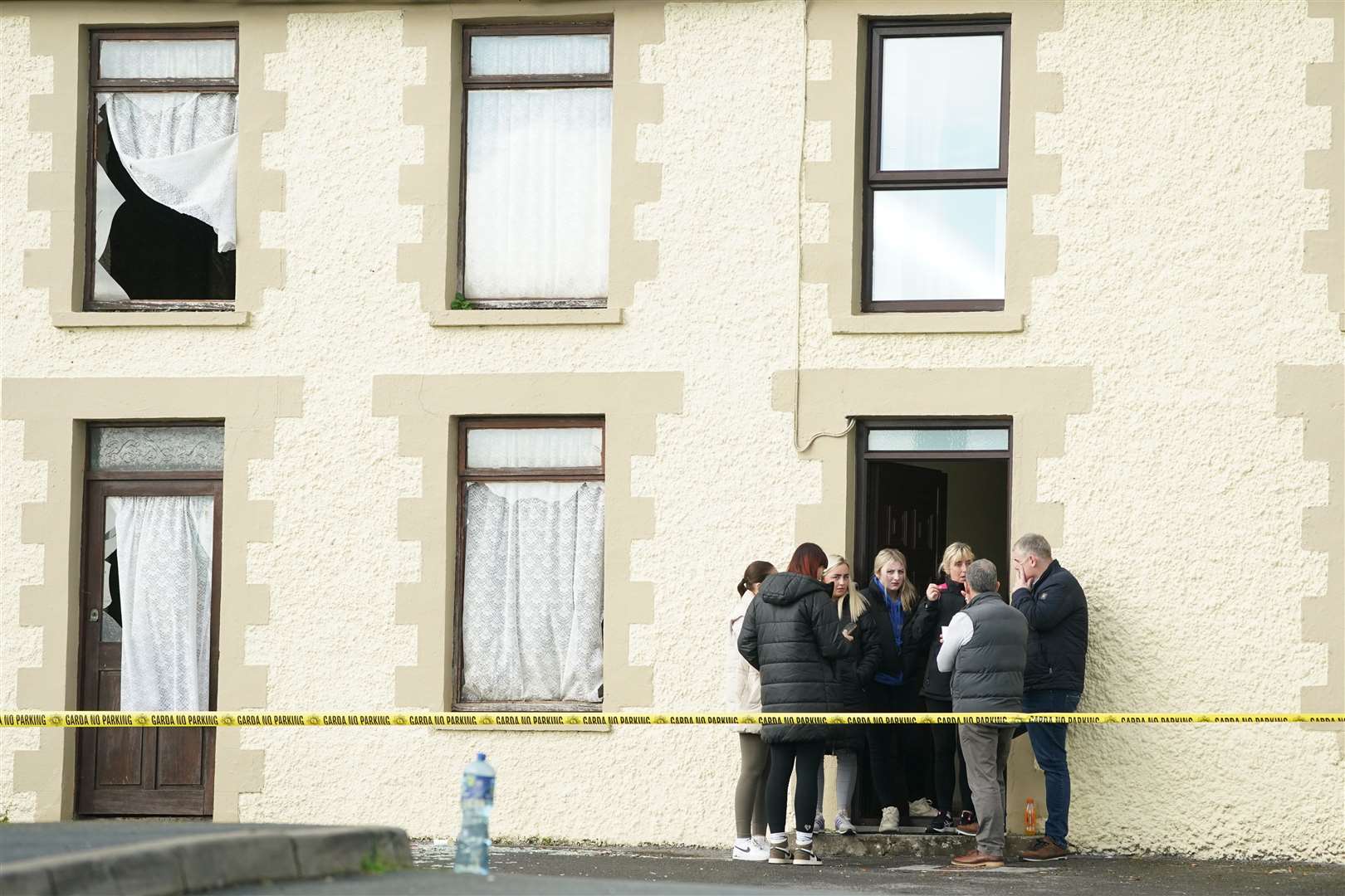 People at nearby damaged buildings (Brian Lawless/PA)