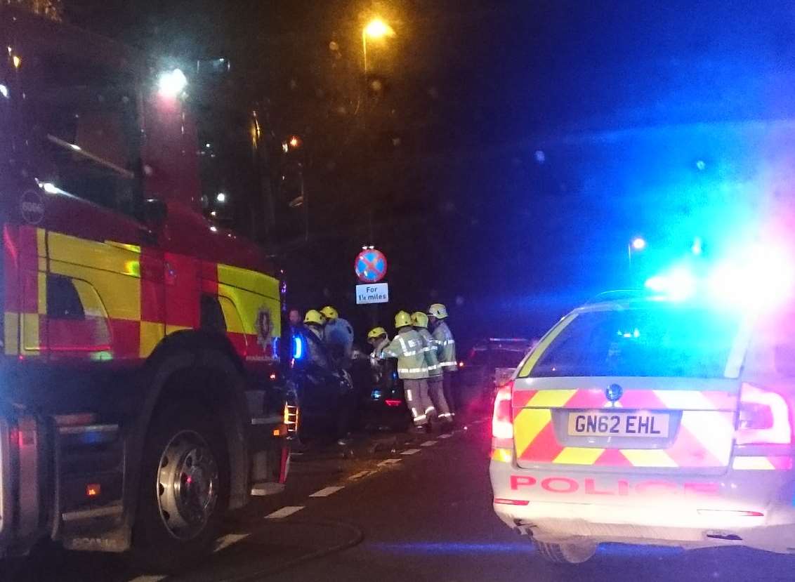 Firefighters work on one of the cars. Picture: @kimmyjaneannis