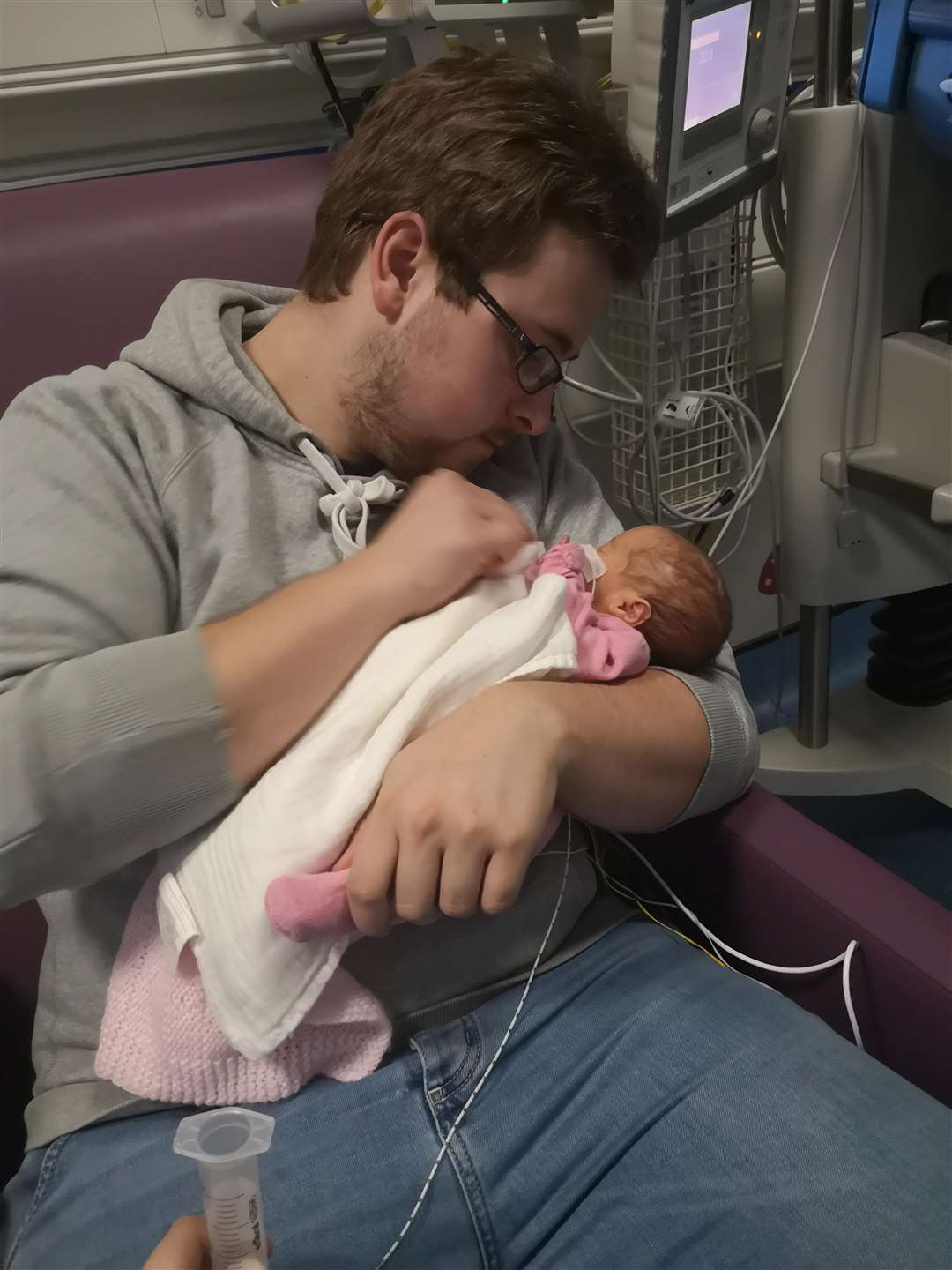 Dad Liam McMahon with baby Phoebe. Picture: SWNS