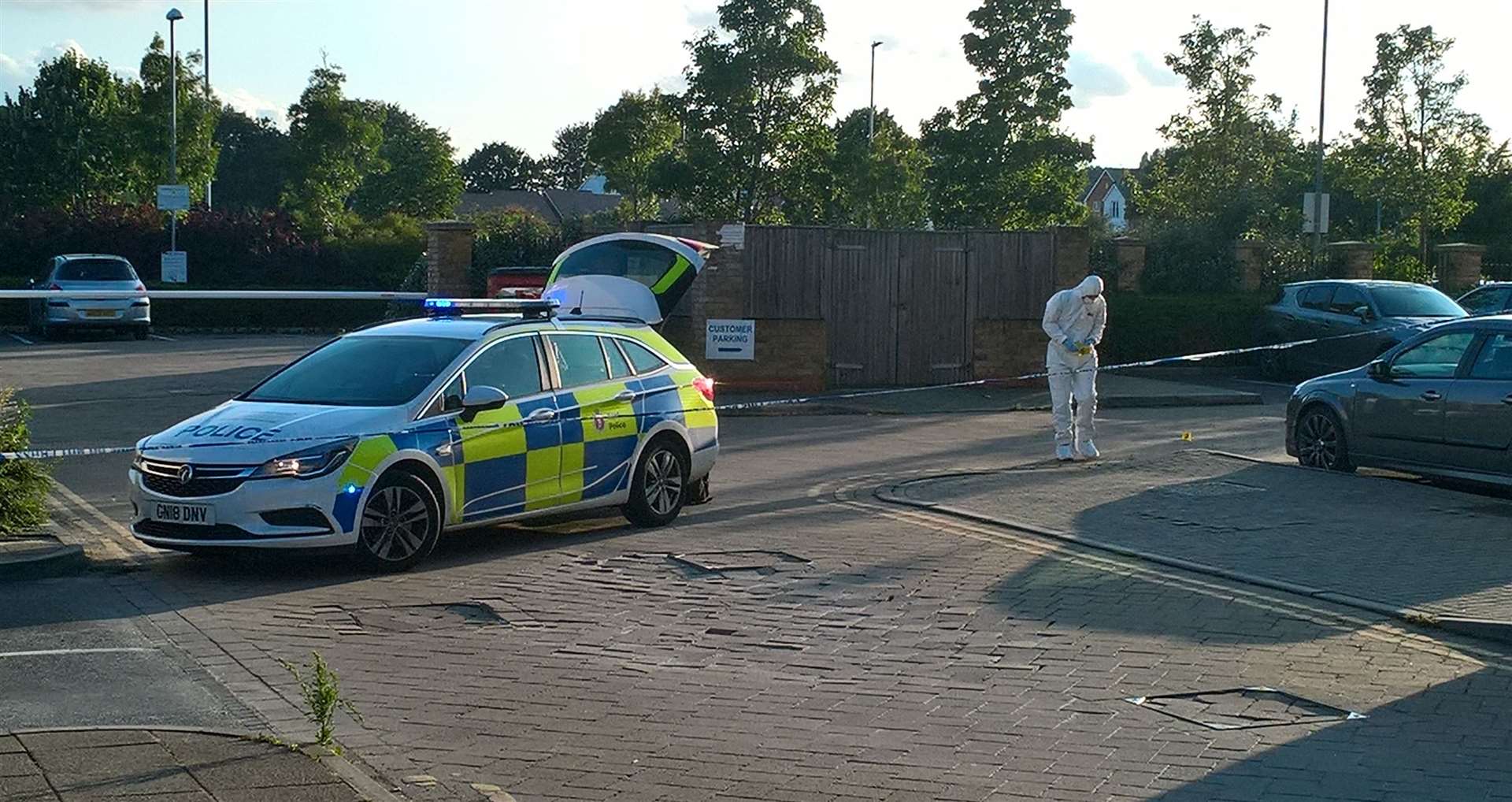 Police and forensics in the car park next to The Jenny Wren pub in Sittingbourne