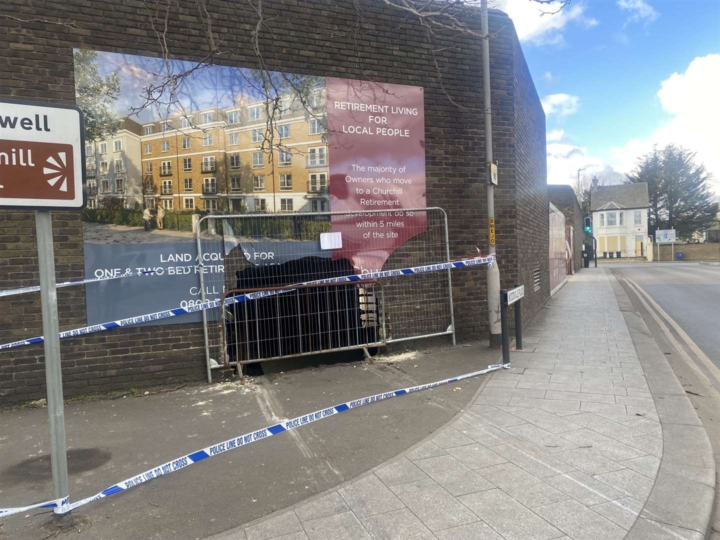 The hole left by a car collision by The Woodville in Gravesend