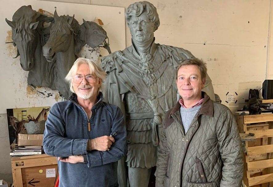 Craig Mackinlay being given a preview of Dominic Grant’s sculpture of George IV