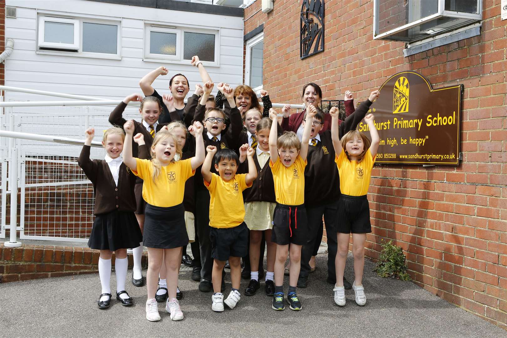 Sandhurst pupils with senior leader Rachel Beaney, head teacher Amanda Norman and senior leader Laura Reeves