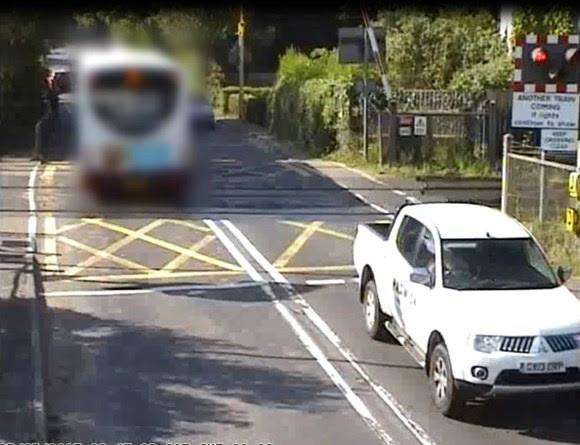 A camera catches a vehicle running a crossing red light (4578750)