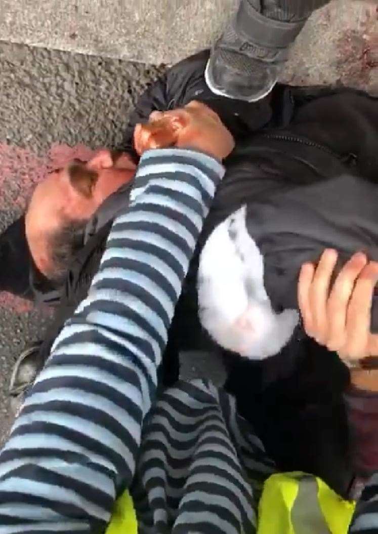 Screengrab from a video issued by Lazar Friedlander of members of the public detaining a man in Stoke Newington (Lazar Friedlander/PA)