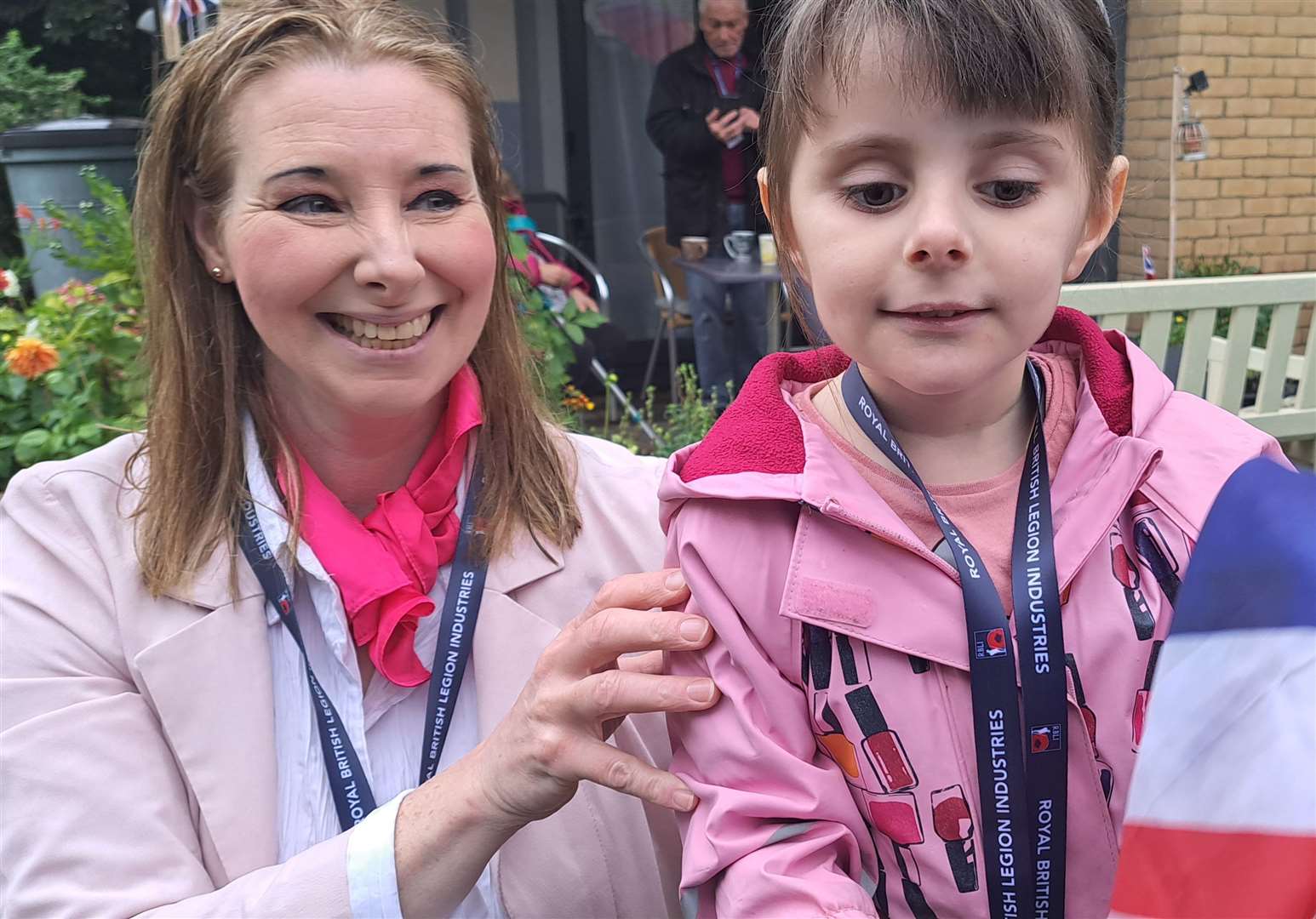 Nicola Carr with daughter Safia Carr, 3, waiting for HRH to arrive