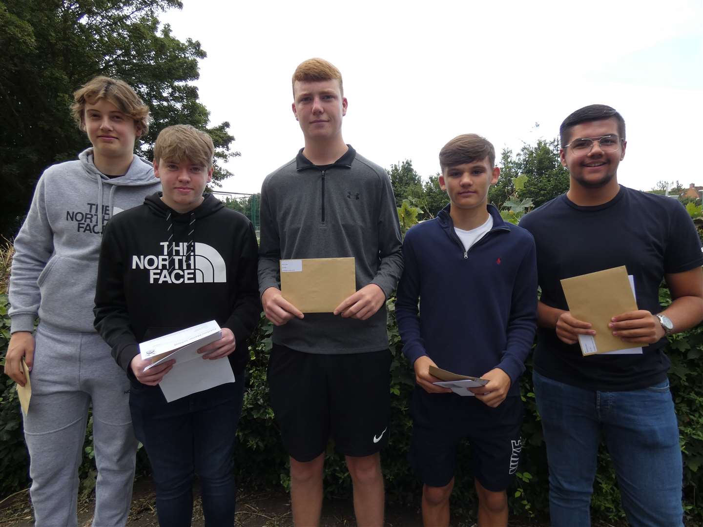 Harley Friar, Jake Humphrey, Jack Mills, Billy Horley and Rhys Medwyn collecting their GCSE results at Fulston Manor School, Sittingbourne
