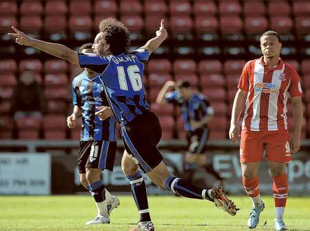 Josh Gowling whells away in delight after opening the scoring