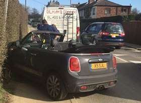 The Mini convertible went off the road. Picture: Andy Baker