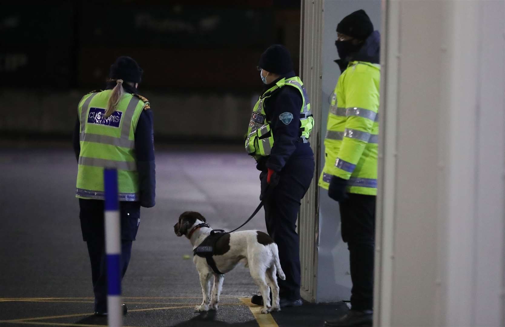 Customs officers wait for trucks at a newly built post Dublin Port as the post-Brexit Irish Sea trading arrangements come into operation (Niall Carson/PA)