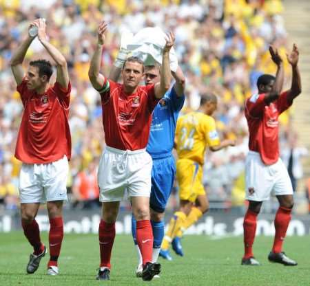 Paul McCarthy (centre) joins team-mates in thanking the Ebbsfleet fans for their support