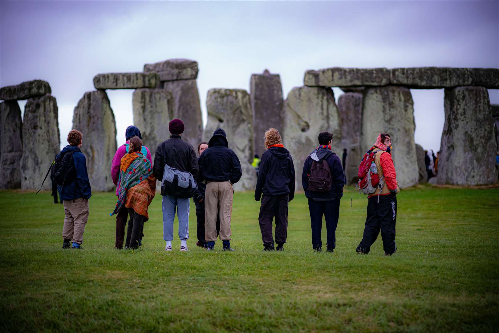 People view the stones during Summer Solstice at Stonehenge (Ben Birchall/PA)