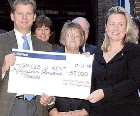 Jonathan Neame, and Geraldine Allinson with the charity cheque. Picture: Gerry Whittaker