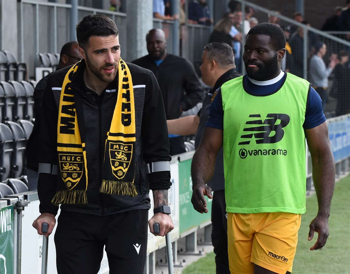 Joan Luque with George Elokobi after suffering his knee injury at Dartford last Easter. Picture: Steve Terrell