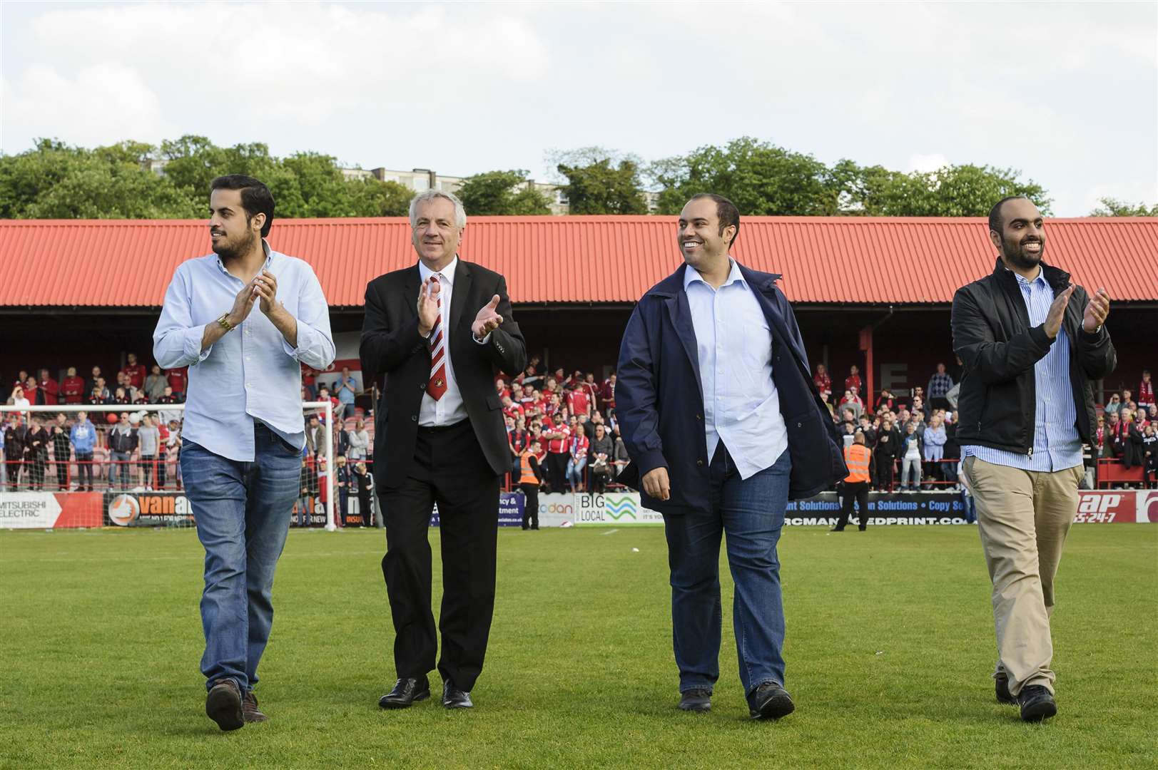 Dr Abdulla al-Humaidi enjoys the moment after Ebbsfleet's promotion in 2017 Picture: Andy Payton