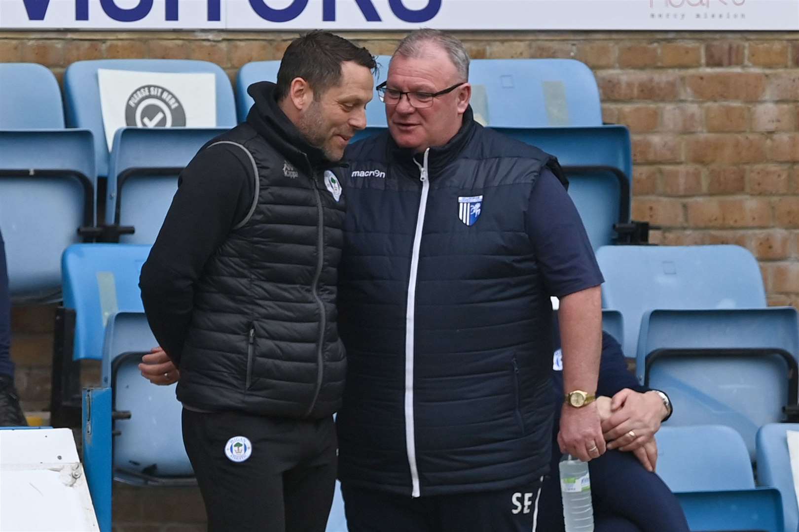 Gillingham boss Steve Evans with Wigan counterpart Leam Richardson Picture: Keith Gillard