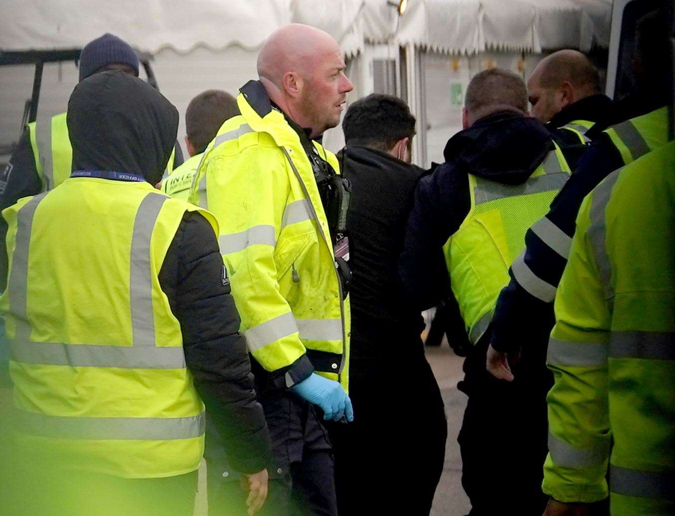 The man dressed in black was taken out of view (Gareth Fuller/PA)