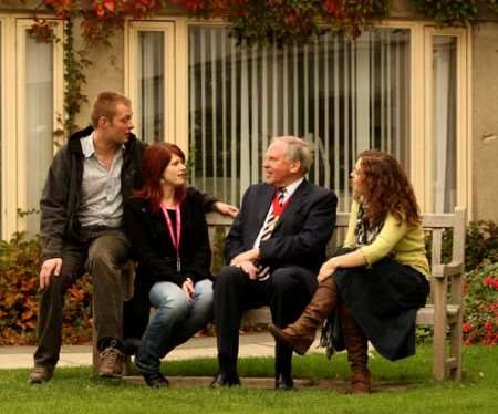 Cllr Leyland Ridings (second right) talks to people who have found careers through volunteering