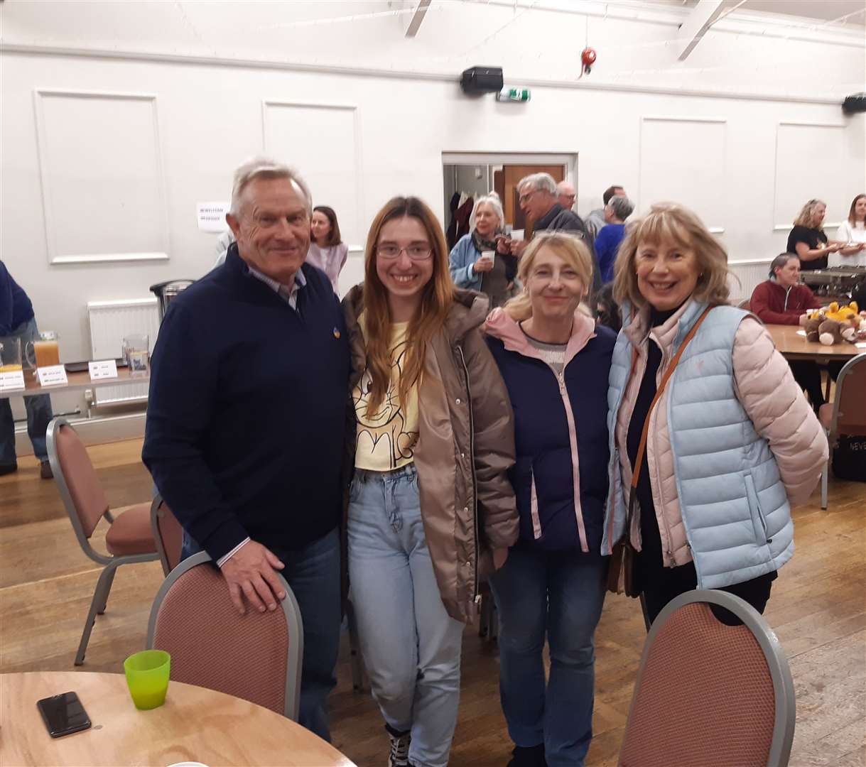 Fraser Dann, far left, and wife Jackie, far right, welcomed Ukrainian nationals Tamara and her daughter Yeva. Photo: Sean Delaney