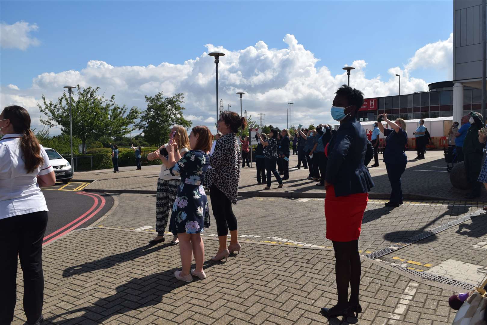 Crowds gathered outside the hospital to watch the spectacle