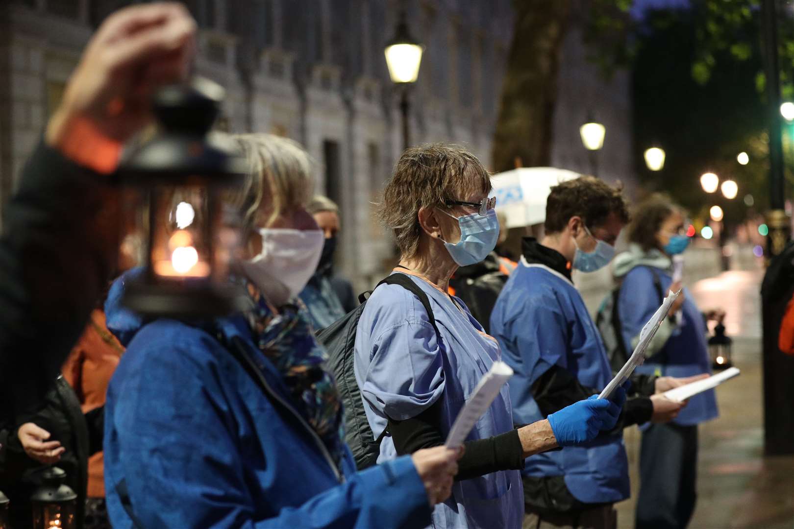 NHS staff and campaigners reading out the names of NHS staff who have died with coronavirus (Jonathan Brady/PA)