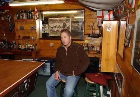 FRUSTRATED: Chris Andrews in his garden games room. Picture: BARRY CRAYFORD