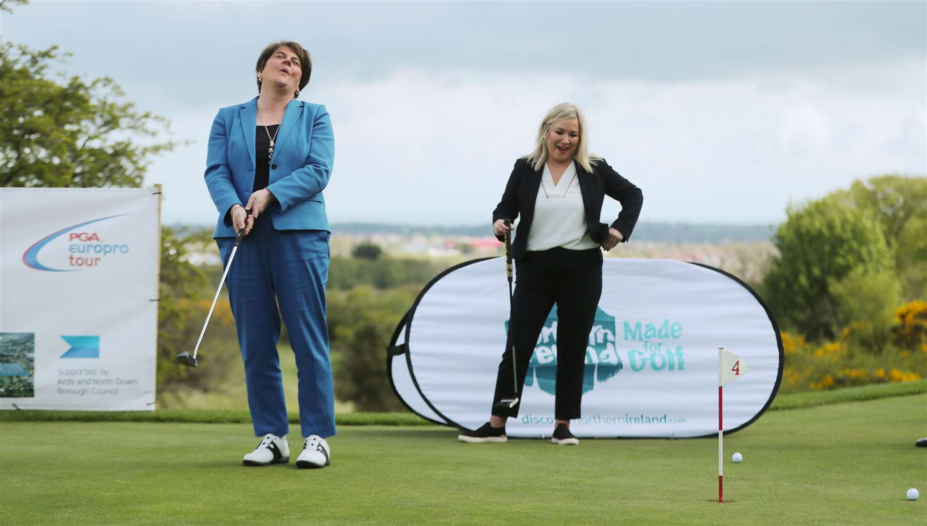 Arlene Foster and Michelle O’Neill at Clandeboye Golf Club (Niall Carson/PA)