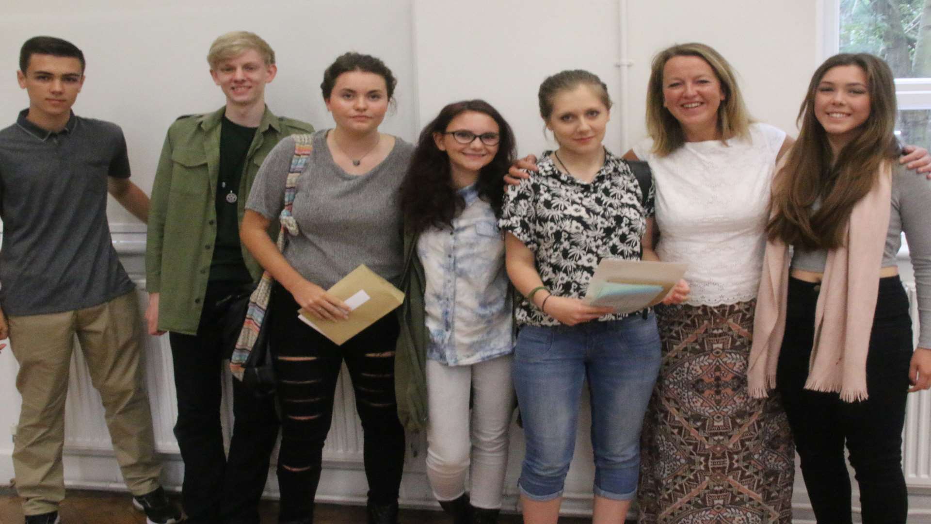 King Ethelbert School: (left to right) Luke Jolles, Matthew Cowell, Caitlin Weightman, Eleanor Clarke, Peri Duncan, head teacher Kate Greig and Amy Fowler