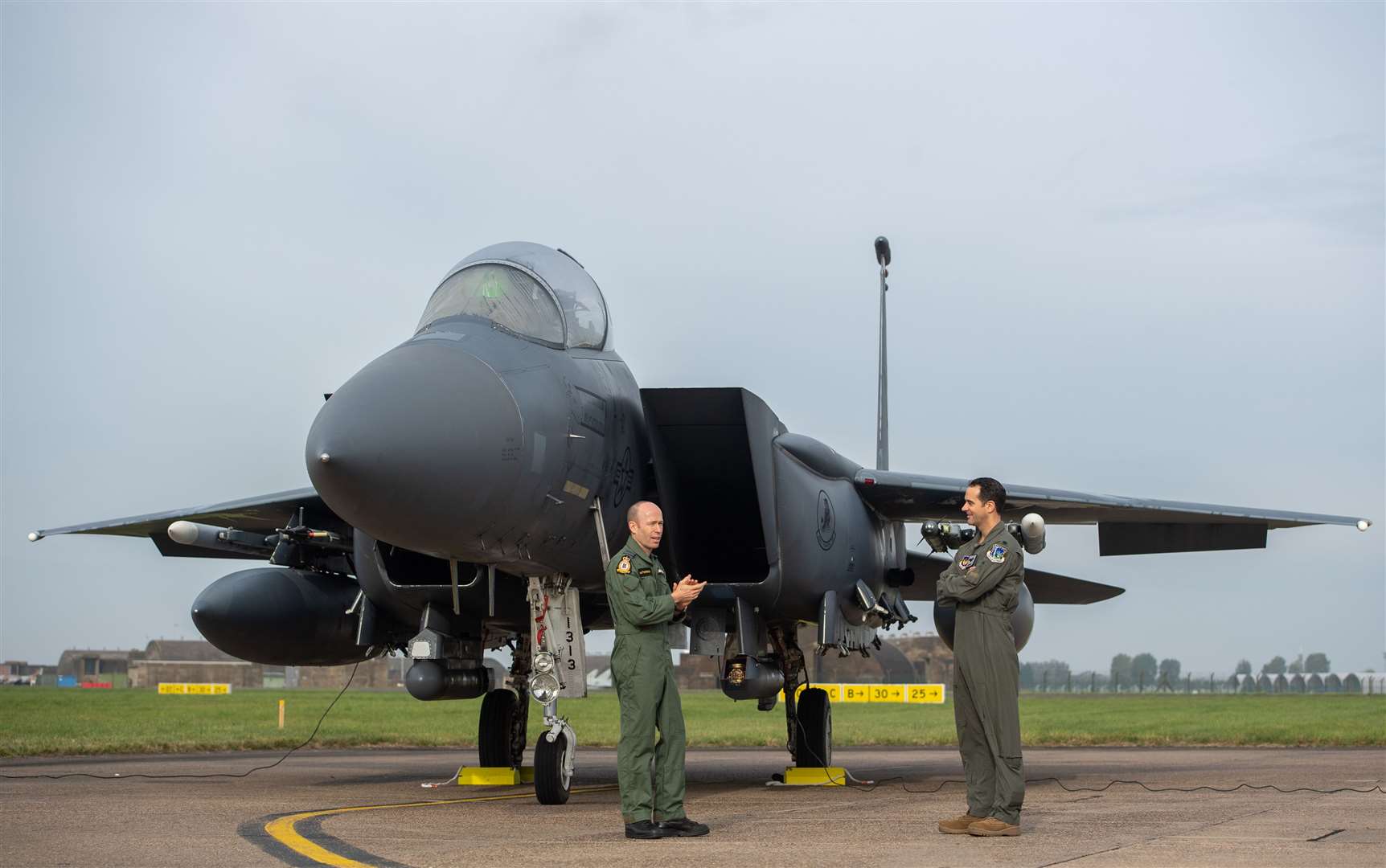 RAF Coningsby Station Commander Group Captain Matt Peterson (left) talks to his USAF counterpart Lieutenant Colonel Jason A Heard (Joe Giddens/ PA)