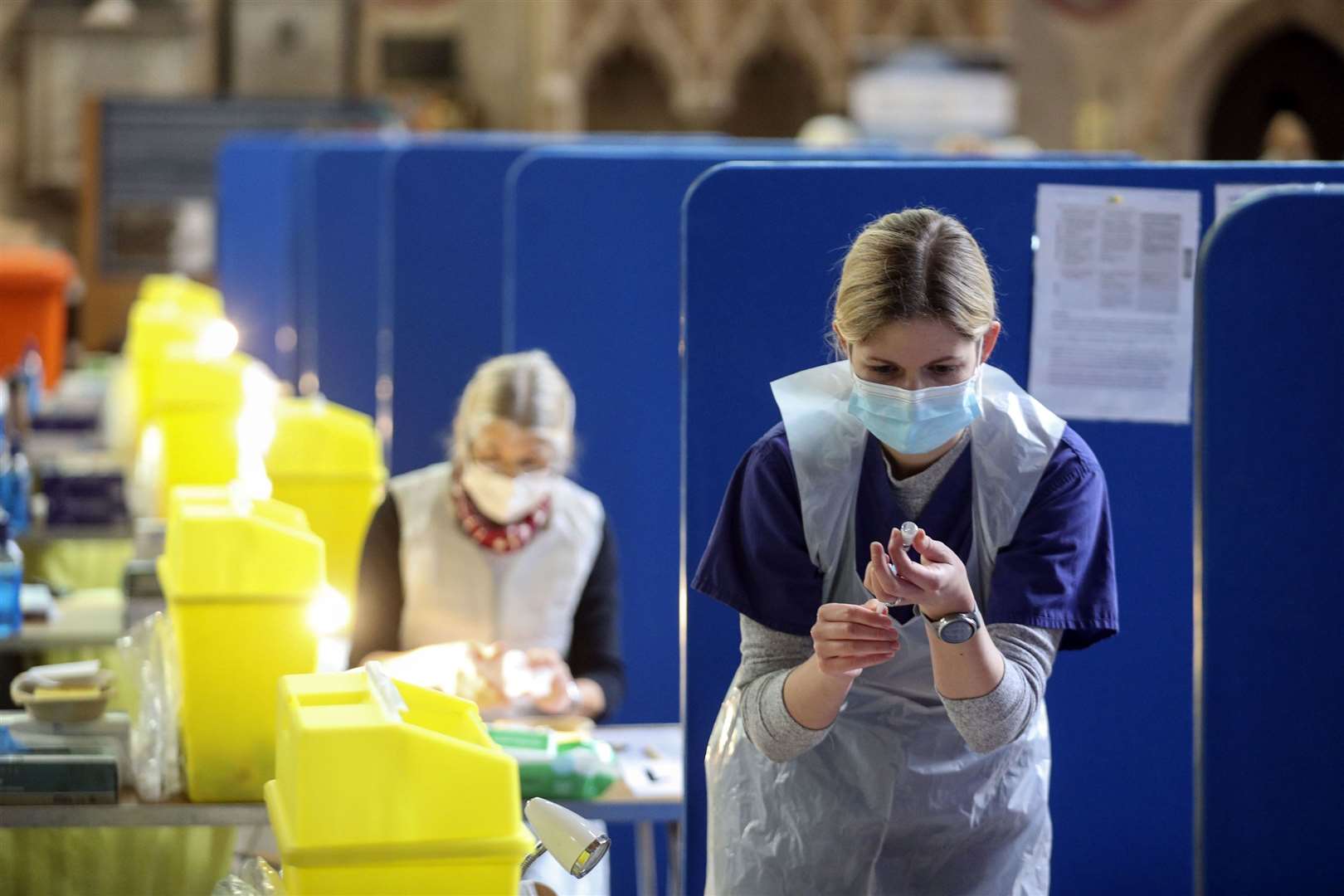 People who are eligible for the third dose of the vaccine to book an appointment. Photo: PA Media