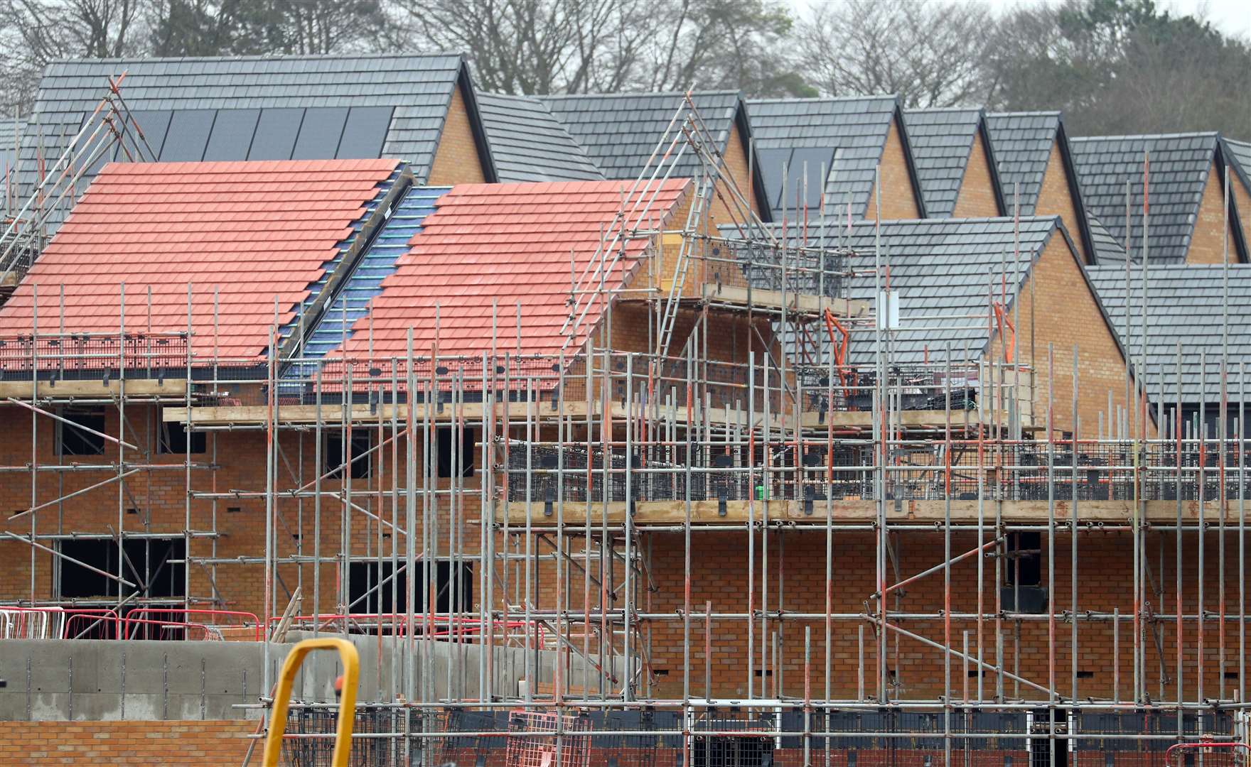 Michael Gove said the UK Government remained ‘committed’ to building 300,000 houses per year (Andrew Matthews/PA)