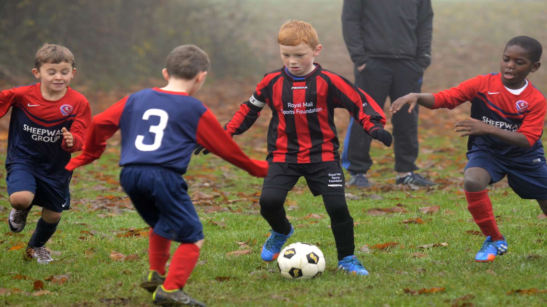 The under-8s of Hempstead Valley Colts and Rainham 84 do battle Picture: Chris Davey