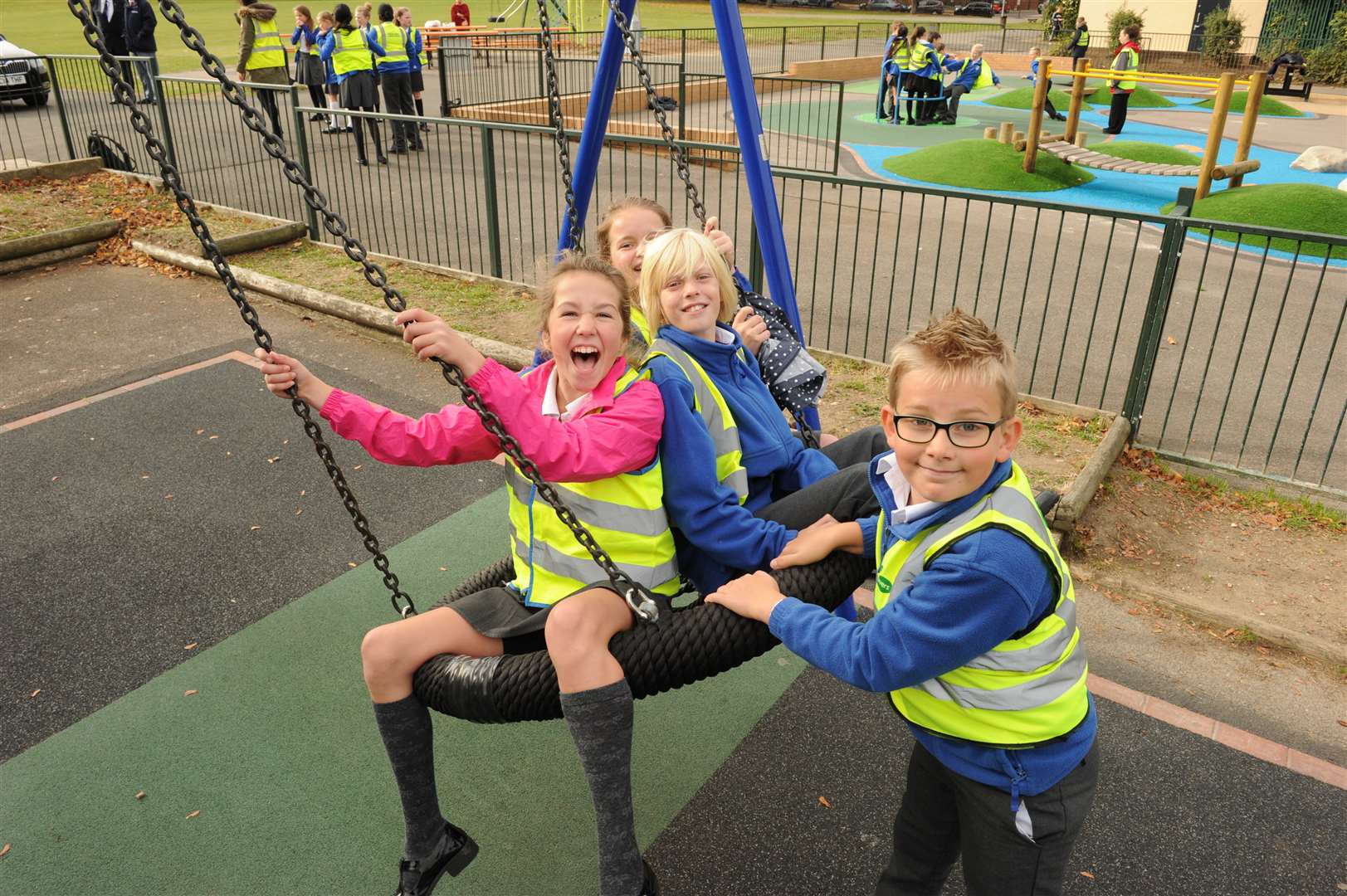 Children from Shears Green School enjoy the playground at Woodlands Park