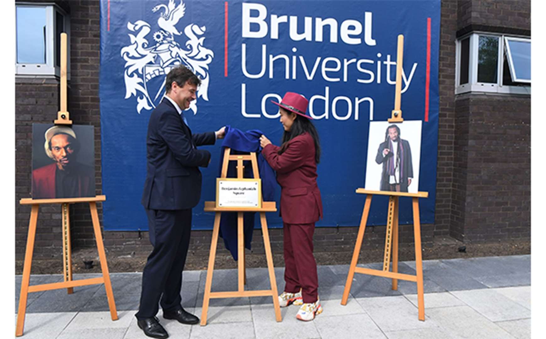 Professor Andrew Jones and Qian Zephaniah unveiling the plaque (Brunel University London/PA)