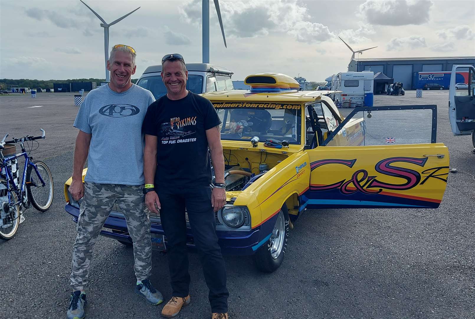 Paul Marston (left) with a fellow enthusiast and his Dodge dragster